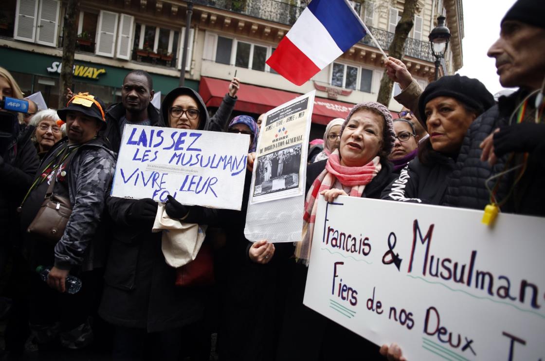 Protestors hold placards during a demo<em></em>nstration against islamophobia, Paris, France, Nov. 10, 2019. (AP Photo)