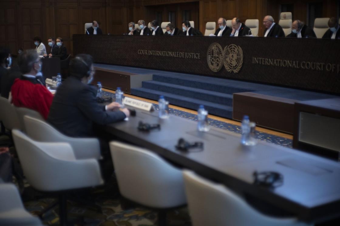 Judge and vice president Kirill Gevorgian of Russia (3rd Right), starts reading the verdict of The Internatio<em></em>nal Court of Justice, the United Nations' top court, which issued its judgment in a dispute between Iran and the United States over frozen Iranian state bank accounts worth some $2 billion, in The Hague, Netherlands, March 30, 2023. (AP Photo)