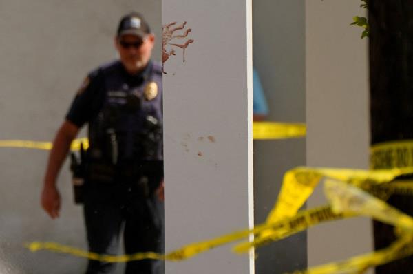 A bloody handprint marks a pillar the day after a shooting during a teenager's birthday party in Dadeville, Alabama, U.S., April 16, 2023. (Reuters Photo)