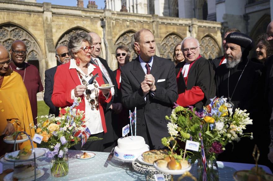 Prince Edward, Duke of Edinburg, tries the official coro<em></em>nation quiche at a Coro<em></em>nation Big Lunch hosted by the Archbishop of Canterbury, at Westminster Abbey, in London, U.K., April 18, 2023. (AP Photo)