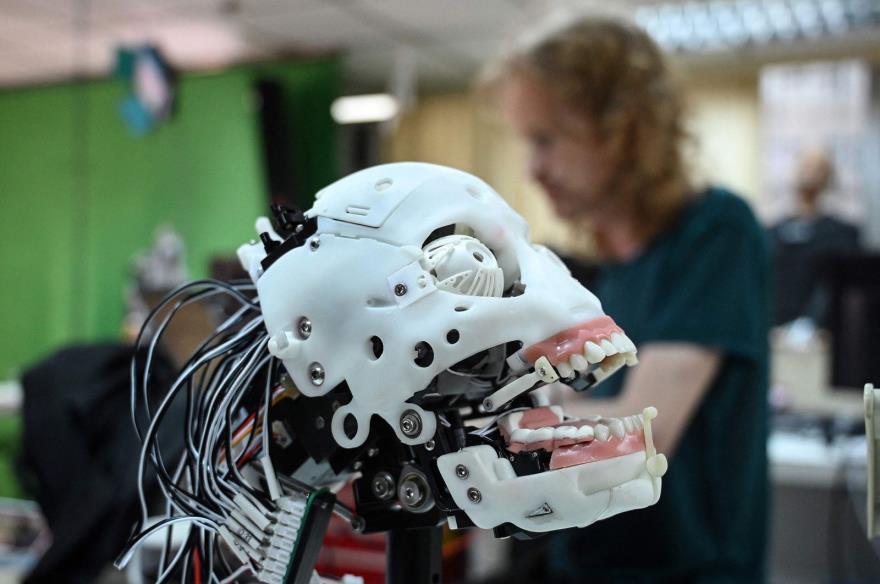 A robot being assembled at Hanson Robotics, a robotics and artificial intelligence company which creates human-like robots, in Hong Kong, May 10, 2023. (AFP Photo)