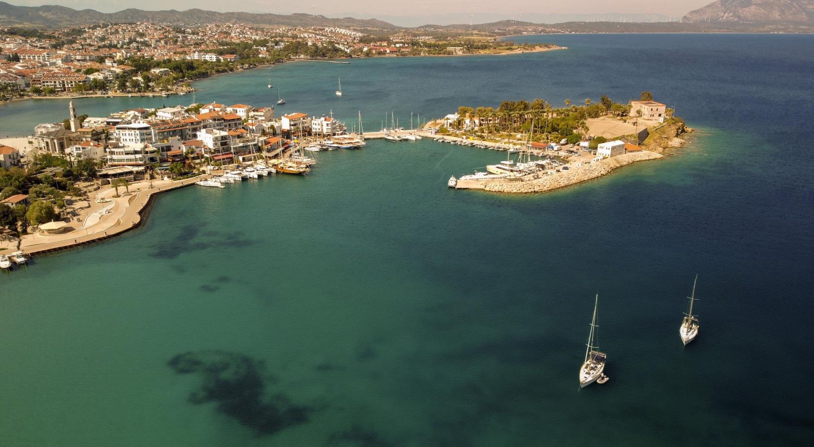 An aerial view shows the Dat?a city center and the Aegean Sea, in Mu?la, Türkiye. (Shutterstock Photo)