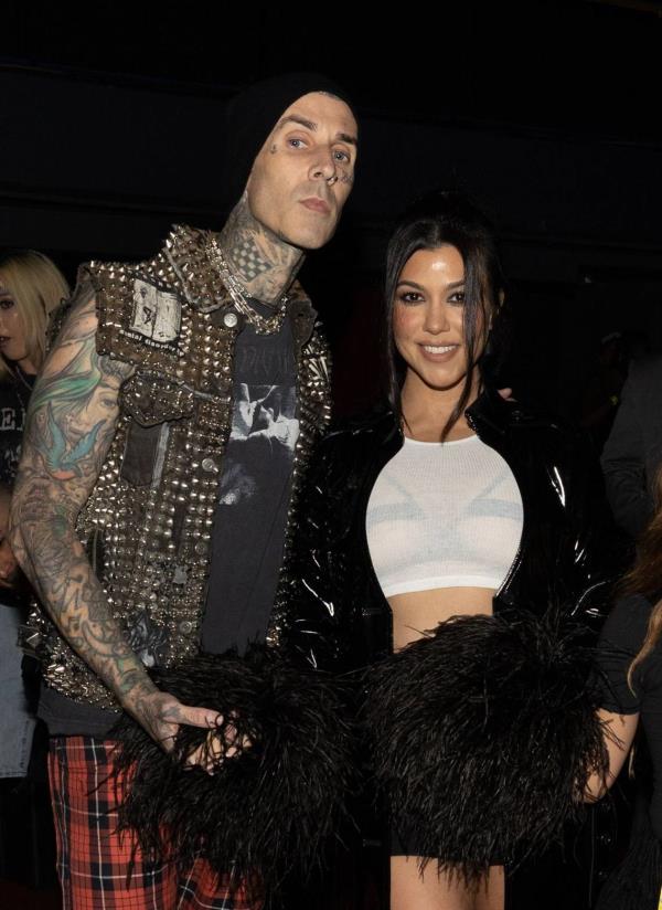 Mandatory Credit: Photo by Christopher Polk/Shutterstock (13031177d)Travis Barker and Kourtney KardashianMachine Gun Kelly in co<em></em>ncert at The Kia Forum, Los Angeles, California, USA - 13 Jul 2022